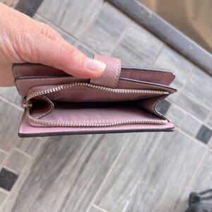 Rose/ blush coach wallet. Lots of card space!